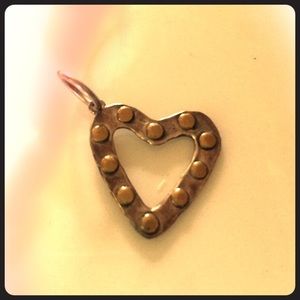 Waxing poetic heart charm.